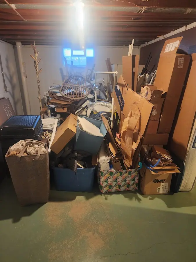 Roll-off dumpster container at job site for 2 Yard Dumpster Rental in San Diego Country Estates